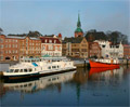 Die Schauseite Kappelns: Die H&auml;user am Hafen Quelle: Wikepedia  Fotograf: Nicolaus Schmidt